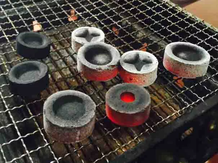 coconut charcoal briquettes burning
